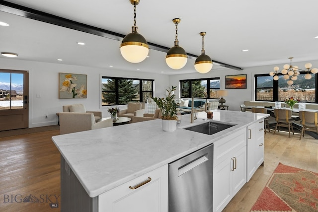 7980 Balsam, Bozeman, MT 59718 - kitchen with dishwasher, healthy amount of natural light, light wood-type flooring, and recessed lighting