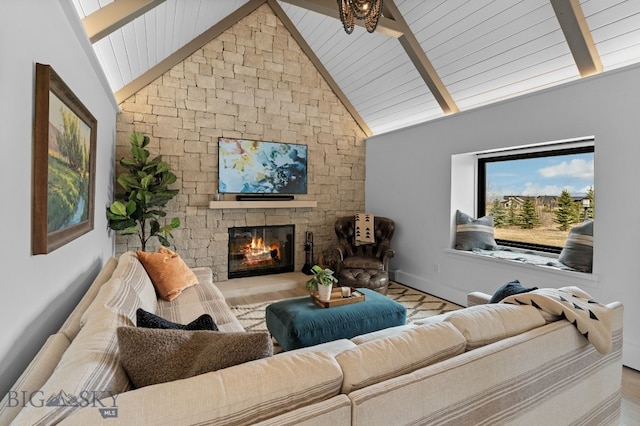 7980 Balsam, Bozeman, MT 59718 - living room with a stone fireplace and wooden ceiling