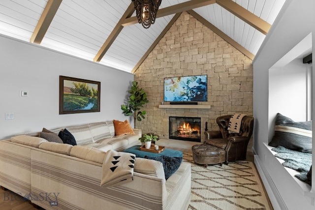 7980 Balsam, Bozeman, MT 59718 - living area featuring a fireplace and wooden ceiling