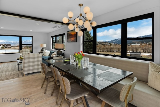7980 Balsam, Bozeman, MT 59718 - dining room with light wood-style flooring, a chandelier, and recessed lighting