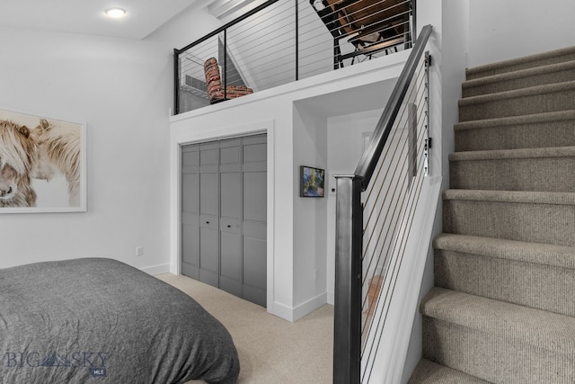 7980 Balsam, Bozeman, MT 59718 - stairway with carpet flooring and a towering ceiling