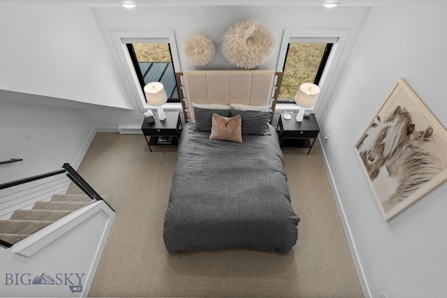 7980 Balsam, Bozeman, MT 59718 - living area featuring carpet flooring, plenty of natural light, and stairs