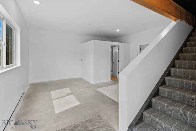 7980 Balsam, Bozeman, MT 59718 - stairway with a baseboard heating unit, concrete flooring, and recessed lighting