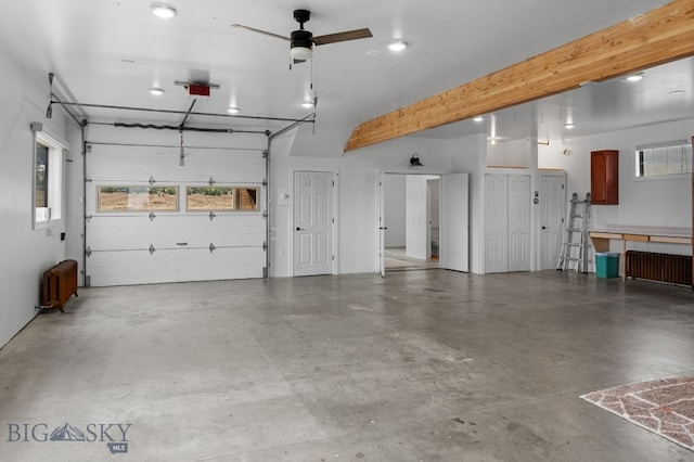 7980 Balsam, Bozeman, MT 59718 - garage with ceiling fan and a garage door opener