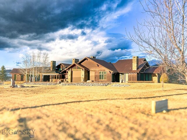 201 Cotton Willow, Melrose, MT 59743 - view of front of property featuring a chimney
