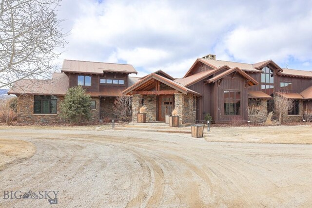 201 Cotton Willow, Melrose, MT 59743 - view of front of house with stone siding and metal roof