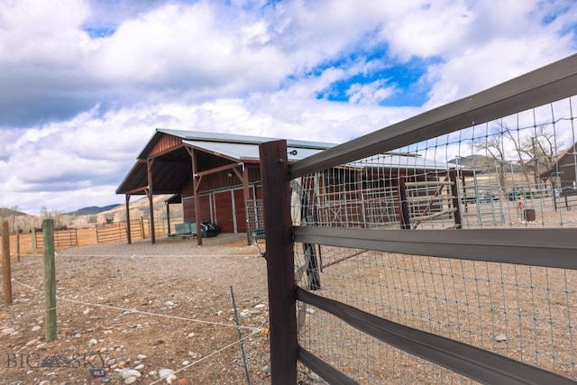 201 Cotton Willow, Melrose, MT 59743 - view of patio featuring an exterior structure and an outdoor structure