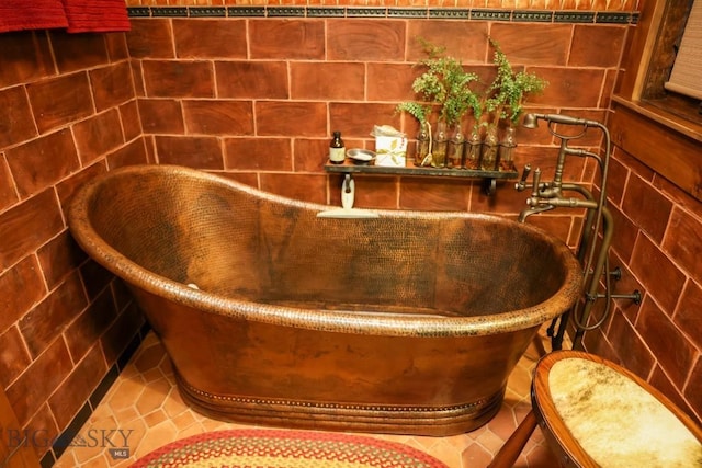 201 Cotton Willow, Melrose, MT 59743 - bathroom with a soaking tub and tile patterned floors