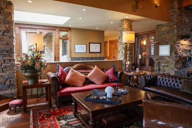 201 Cotton Willow, Melrose, MT 59743 - living area with wood finished floors, recessed lighting, and a skylight