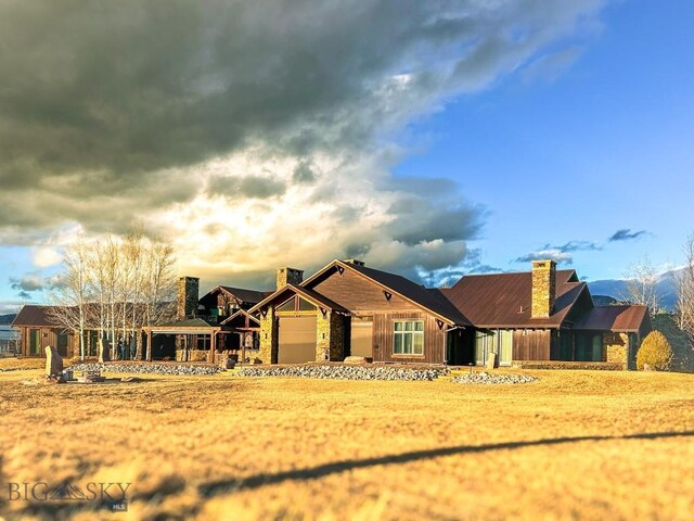 201 Cotton Willow, Melrose, MT 59743 - view of front of house featuring a chimney
