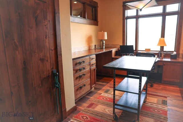 201 Cotton Willow, Melrose, MT 59743 - office space with healthy amount of natural light and dark wood-style floors