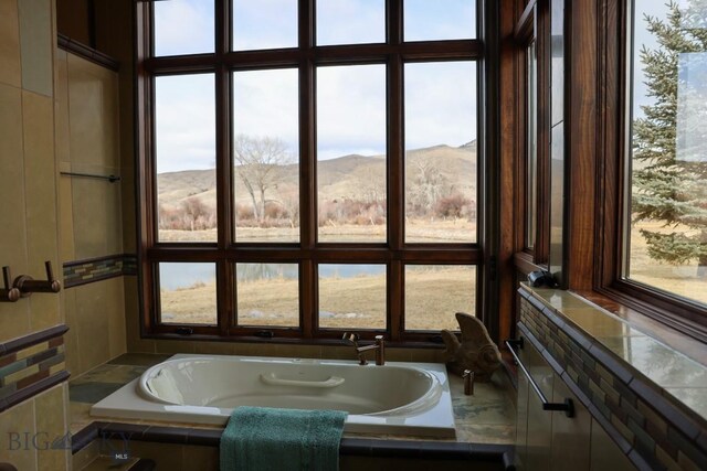 201 Cotton Willow, Melrose, MT 59743 - full bathroom with a bath and a mountain view