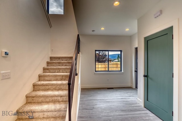 1104 Ridgeview Trl, Livingston, MT 59047 - staircase featuring wood finished floors and recessed lighting