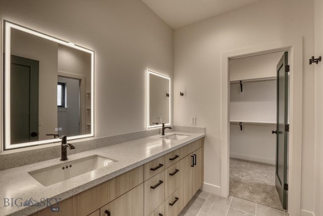 1104 Ridgeview Trl, Livingston, MT 59047 - full bathroom with double vanity, tile patterned flooring, and a walk in closet