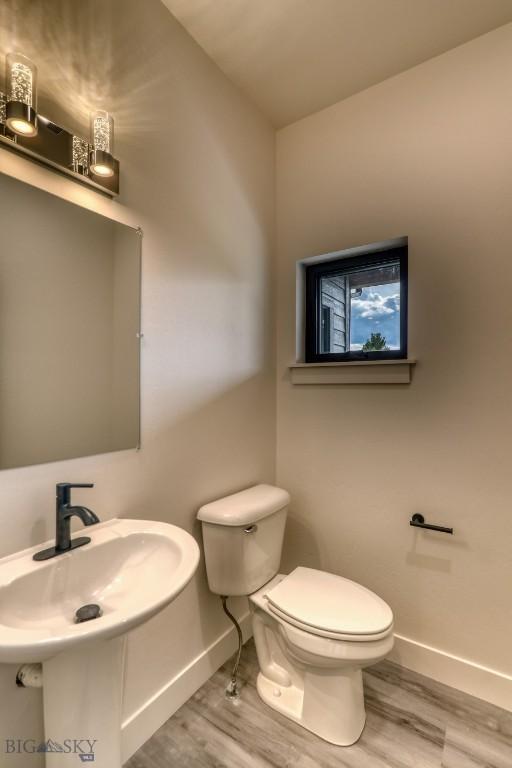 1104 Ridgeview Trl, Livingston, MT 59047 - half bathroom with wood finished floors
