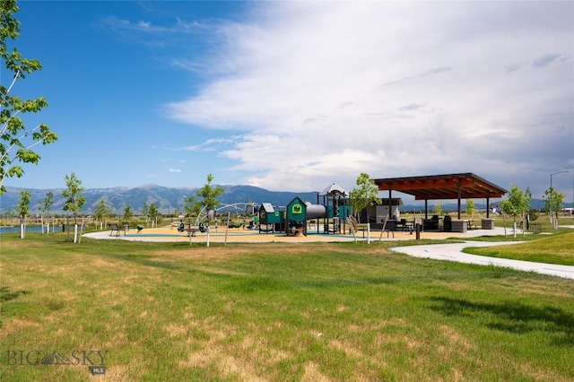 602 Mira Way Unit A, Belgrade, MT 59714 - view of community featuring a lawn and a mountain view