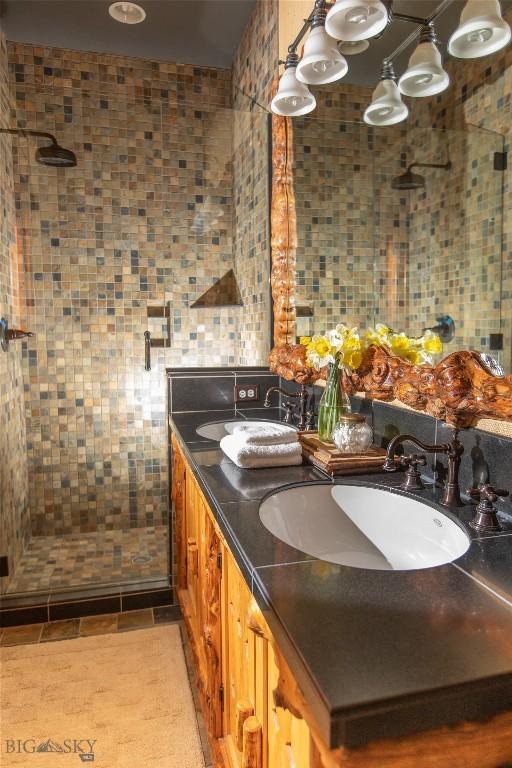31255 Ninemile Rd, Huson, MT 59846 - full bath with a shower stall, double vanity, and tile walls