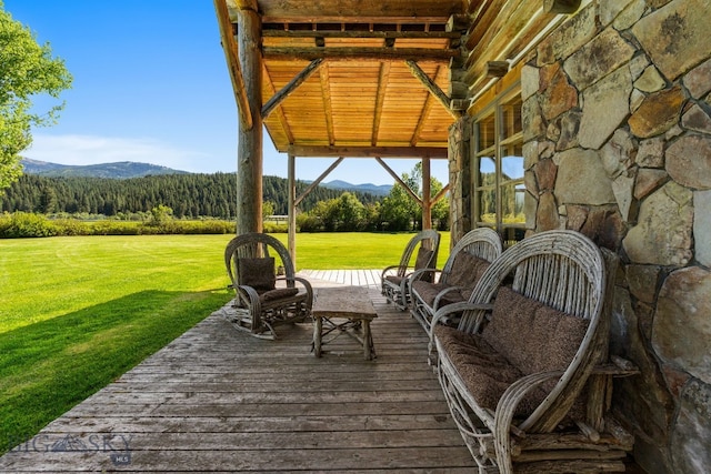 31255 Ninemile Rd, Huson, MT 59846 - wooden terrace with a mountain view and a lawn