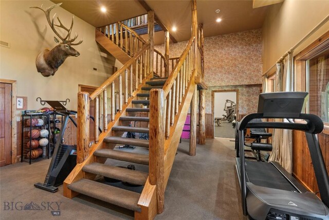 31255 Ninemile Rd, Huson, MT 59846 - stairway with a towering ceiling, carpet flooring, and recessed lighting