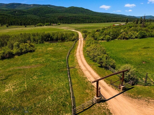 31255 Ninemile Rd, Huson, MT 59846 - aerial view of sparsely populated area featuring a mountainous background and a forest