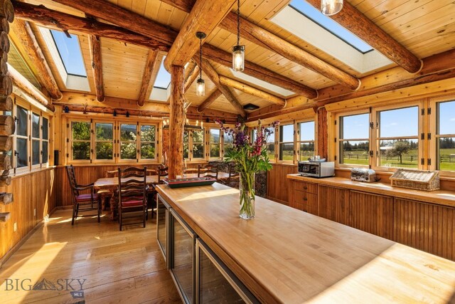 31255 Ninemile Rd, Huson, MT 59846 - sunroom with a skylight, french doors, healthy amount of natural light, and wine cooler