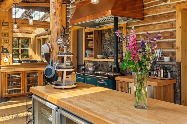 31255 Ninemile Rd, Huson, MT 59846 - bar featuring wine cooler, island range hood, and wood finished floors