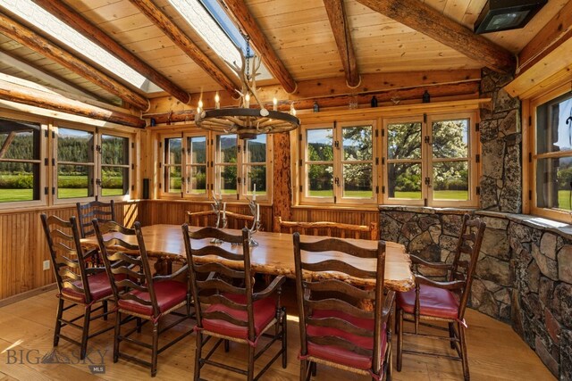 31255 Ninemile Rd, Huson, MT 59846 - sunroom with a chandelier, plenty of natural light, a skylight, and french doors