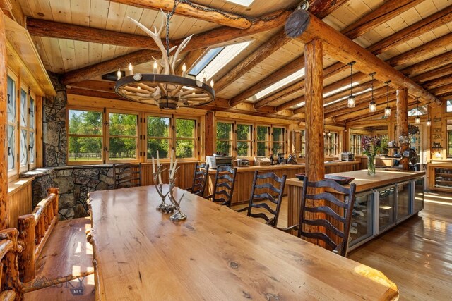 31255 Ninemile Rd, Huson, MT 59846 - dining area featuring wooden ceiling, wood-type flooring, and a chandelier
