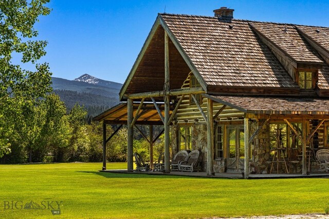 31255 Ninemile Rd, Huson, MT 59846 - view of property's community featuring a mountain view and a lawn
