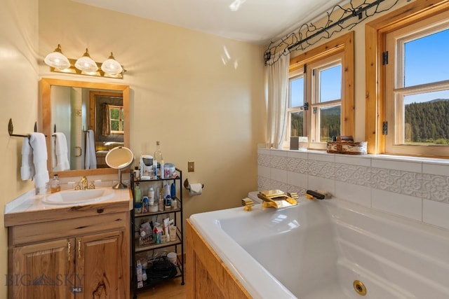 31255 Ninemile Rd, Huson, MT 59846 - bathroom featuring a whirlpool tub and vanity
