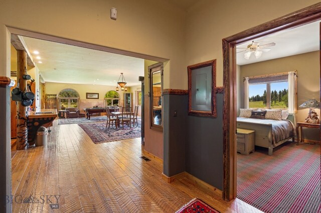 31255 Ninemile Rd, Huson, MT 59846 - hall featuring plenty of natural light, hardwood / wood-style flooring, baseboards, and recessed lighting