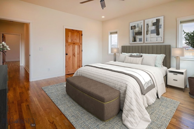 49 Wild Rye Pl, Three Forks, MT 59752 - bedroom with multiple windows, wood finished floors, recessed lighting, and ceiling fan