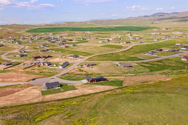 49 Wild Rye Pl, Three Forks, MT 59752 - aerial overview of property's location with mountains