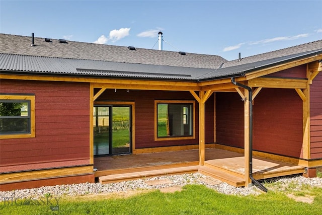 49 Wild Rye Pl, Three Forks, MT 59752 - rear view of house with roof with shingles and a wooden deck