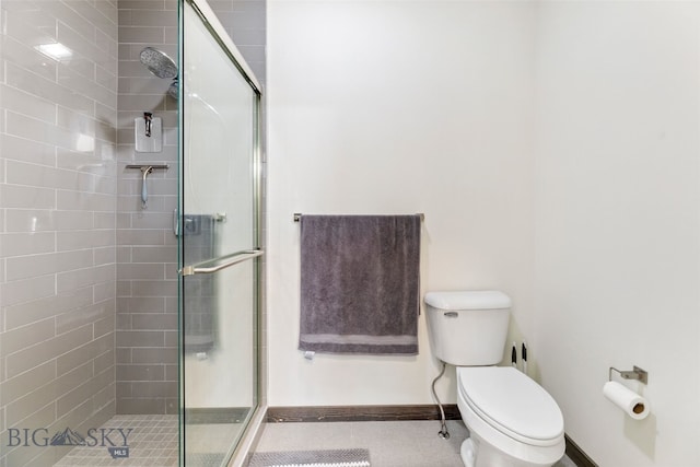 104 Albrey Trl Unit C, Bozeman, MT 59718 - full bathroom featuring a stall shower, toilet, and baseboards