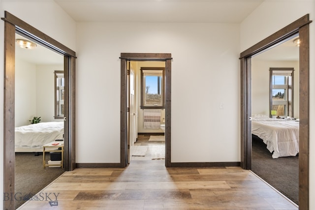 104 Albrey Trl Unit C, Bozeman, MT 59718 - corridor featuring light wood finished floors and baseboards