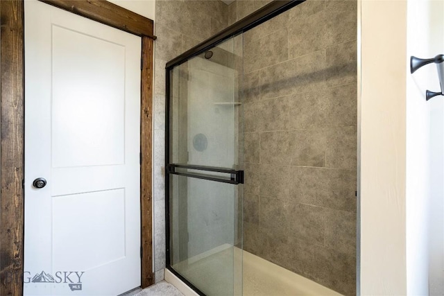 bathroom with a stall shower