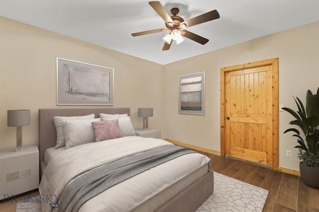 480 Moose Crossing Rd, Gallatin Gateway, MT 59730 - bedroom with dark wood-style flooring and ceiling fan