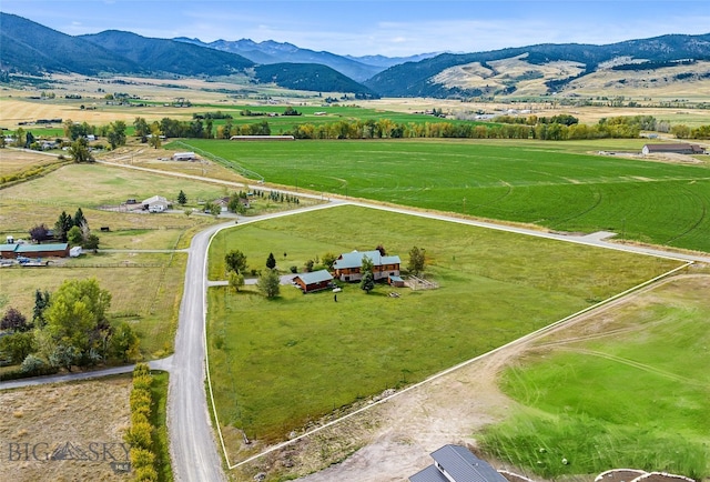 480 Moose Crossing Rd, Gallatin Gateway, MT 59730 - aerial view of sparsely populated area featuring a mountain backdrop and agricultural land
