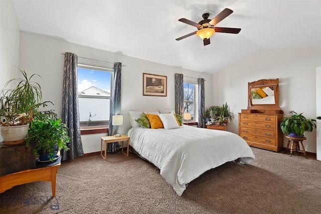 818 Quail Run Unit B, Bozeman, MT 59718 - carpeted bedroom featuring multiple windows, lofted ceiling, ceiling fan, and baseboards