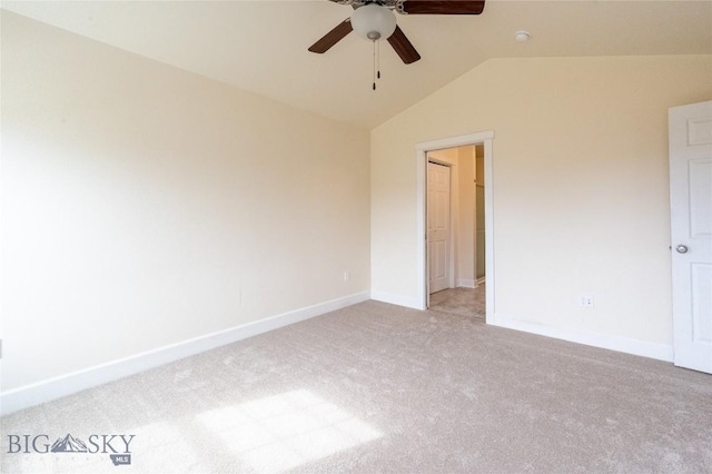 2300 Sturnella Ln, Belgrade, MT 59714 - unfurnished room featuring light colored carpet, lofted ceiling, a ceiling fan, and baseboards