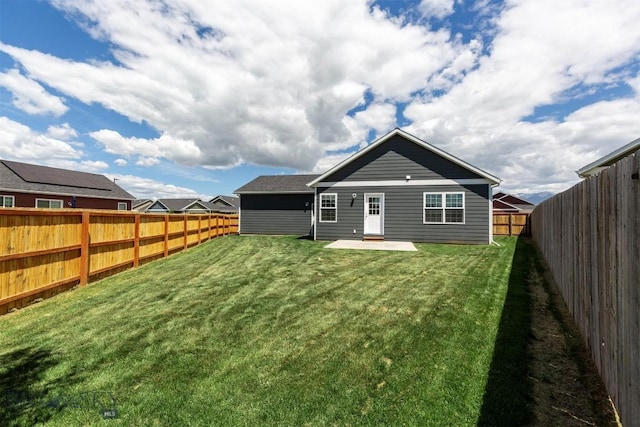 2300 Sturnella Ln, Belgrade, MT 59714 - rear view of house with a patio area