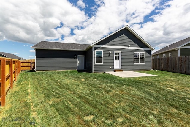 2300 Sturnella Ln, Belgrade, MT 59714 - back of house with a patio area