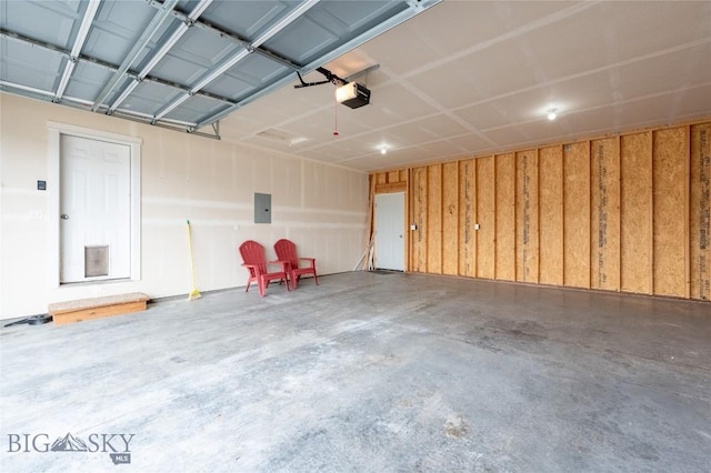 2300 Sturnella Ln, Belgrade, MT 59714 - garage featuring a garage door opener and electric panel
