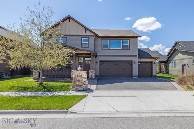 2026 Southbridge, Bozeman, MT 59718 - craftsman inspired home with board and batten siding, asphalt driveway, a garage, and a front lawn