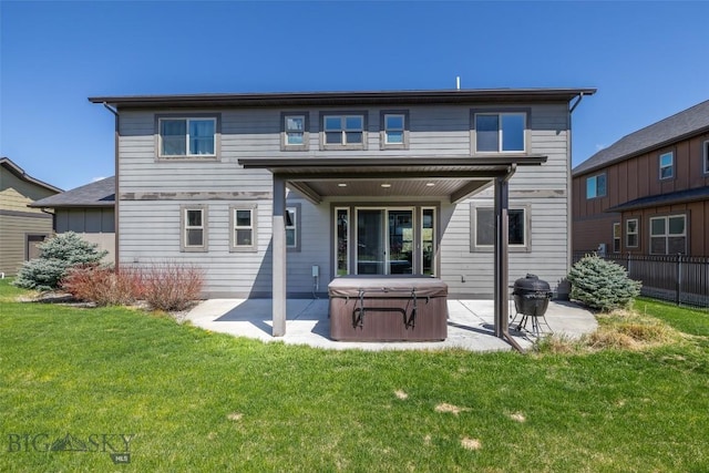 2026 Southbridge, Bozeman, MT 59718 - back of property with a hot tub and a patio