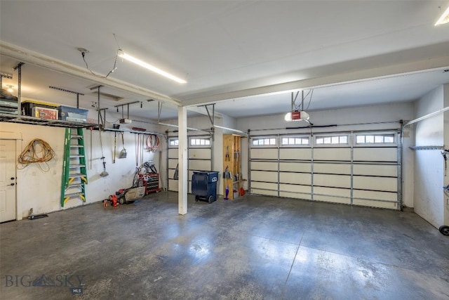 2026 Southbridge, Bozeman, MT 59718 - garage featuring a garage door opener