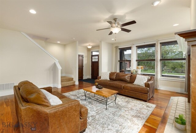 2026 Southbridge, Bozeman, MT 59718 - living room featuring stairs, baseboards, recessed lighting, ceiling fan, and wood finished floors