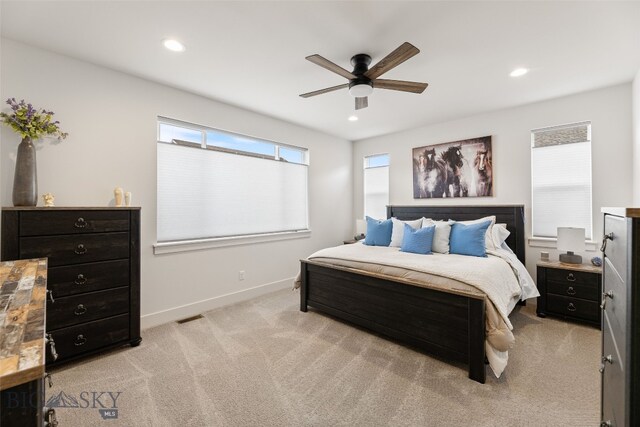 1502 Cyril Way, Belgrade, MT 59714 - bedroom featuring light carpet, recessed lighting, baseboards, and ceiling fan