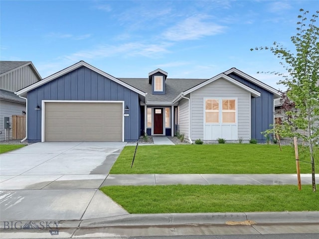 1502 Cyril Way, Belgrade, MT 59714 - view of front facade with a garage, a front lawn, driveway, a shingled roof, and board and batten siding